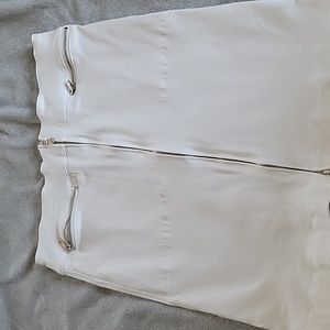 White new without tags skirt with zipper details. Size 8